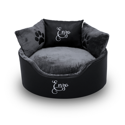Soft black leather and grey dog and cat bed with personalised name embroidery, providing comfort and style for your pet.