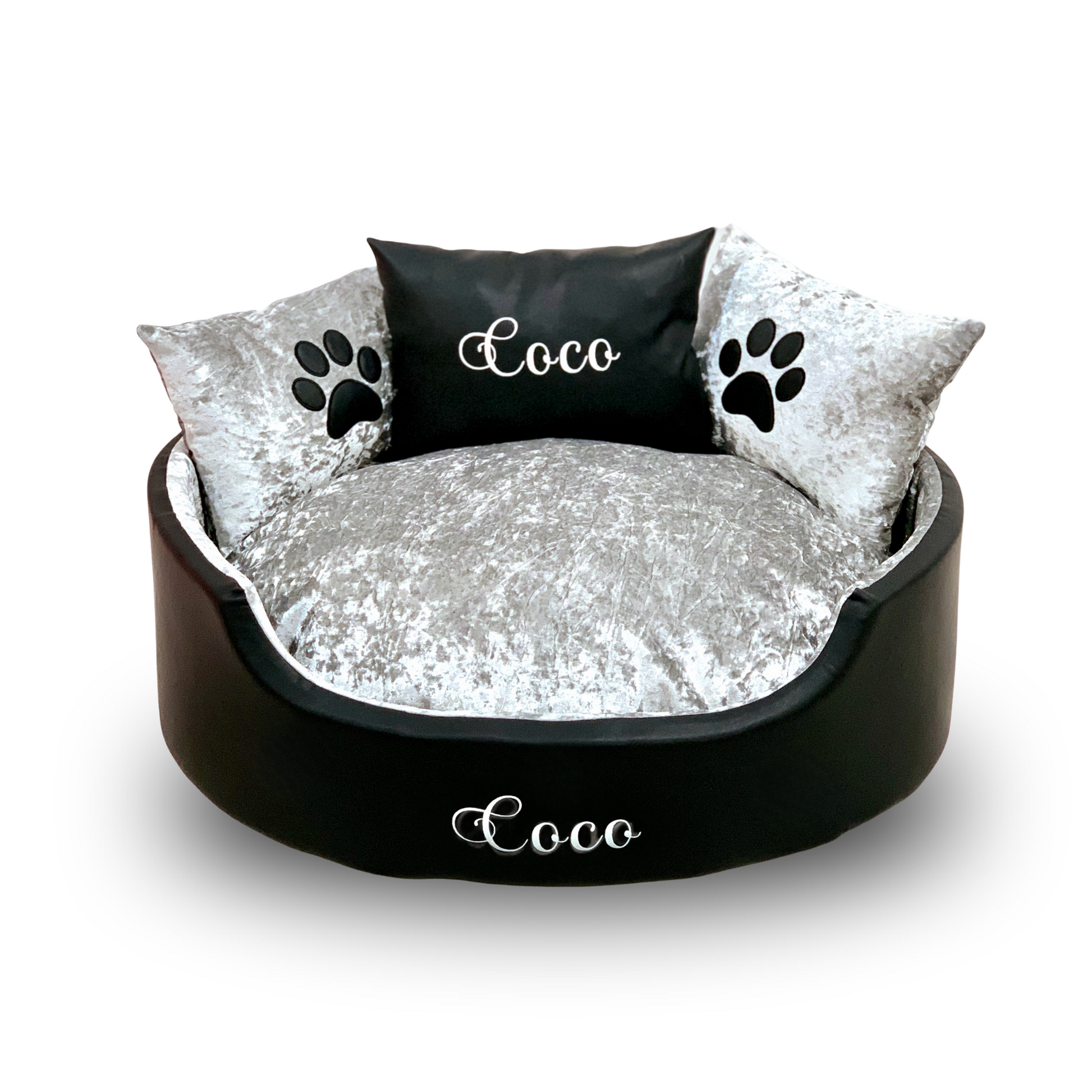 Soft black leather and silver crushed dog and cat bed with personalised name embroidery, providing comfort and style for your pet.