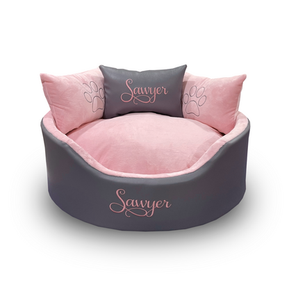 Soft and cozy grey and pink dog and cat bed with personalised name embroidery for ultimate pet comfort.