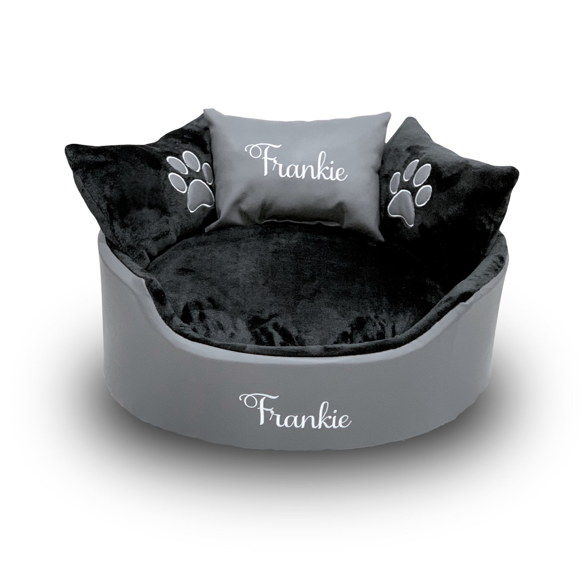 Soft grey leather and black dog and cat bed with personalised name embroidery, providing comfort and style for your pet.
