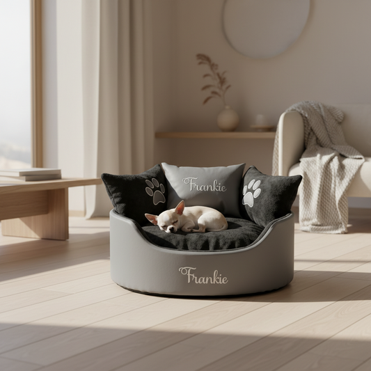Soft grey leather and black dog and cat bed with personalised name embroidery, providing comfort and style for your pet.