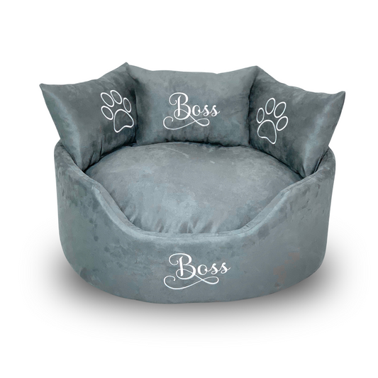 Soft grey suede dog and cat bed with personalised name embroidery, providing comfort and style for your pet.