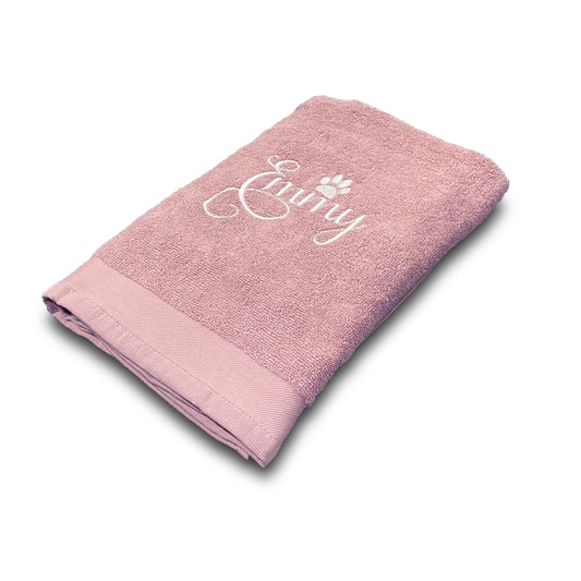 Soft absorbent pink dog and cat towel with personalised name embroidery, perfect for bath time or drying after walks.