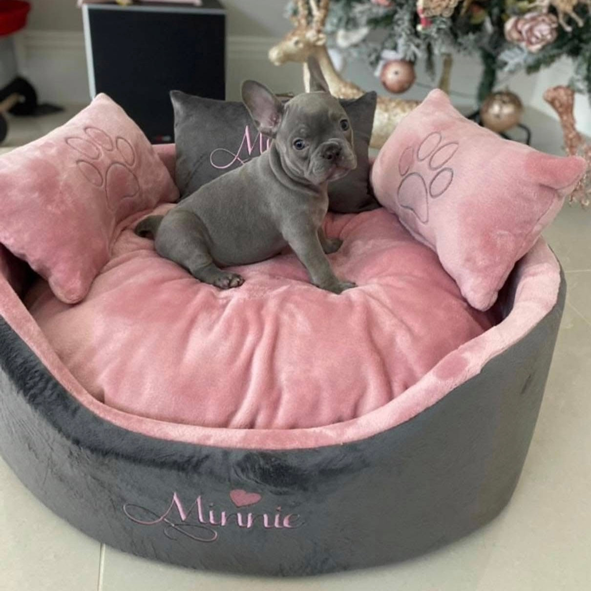 Soft pink and grey dog and cat bed with personalised name embroidery, providing comfort and style for your pet.