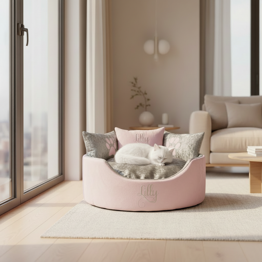 Soft pink suede and silver crushed dog and cat bed with personalised name embroidery, providing comfort and style for your pet.