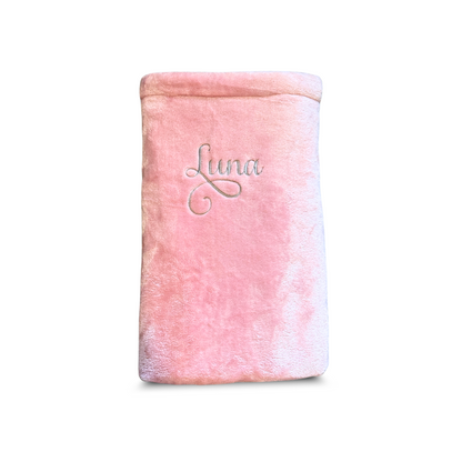 Personalised pink super soft blanket with custom embroidered name, made from plush fleece fabric.